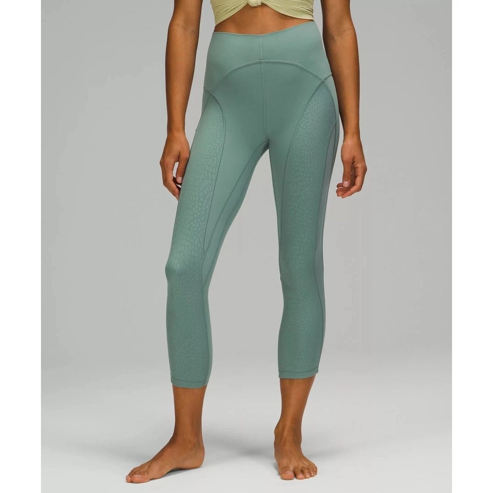 Lululemon Nulu Mesh Mid-Rise Pant Size 10 Tidewater Teal Crop 23" Yoga Athletic